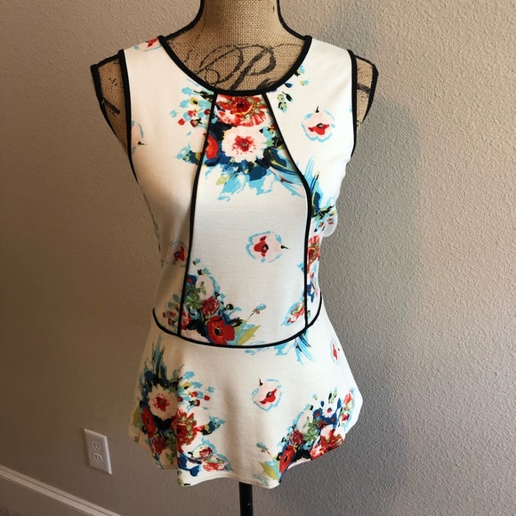 Anthropologie Tops - Anthropologie peplum floral top